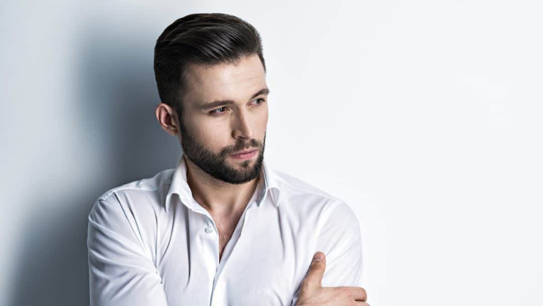 handsome man white shirt posing attractive guy with fashion hairstyle confident man with short beard adult boy with brown hair closeup portrait scaled